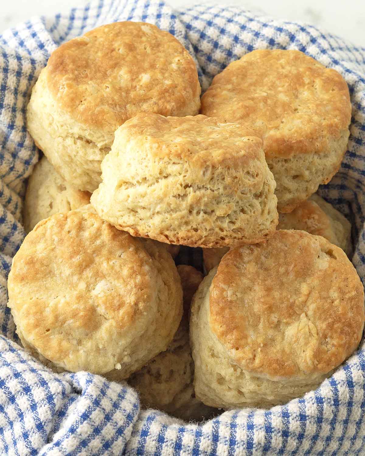 A towel lined bowl filled with vegan biscuits.