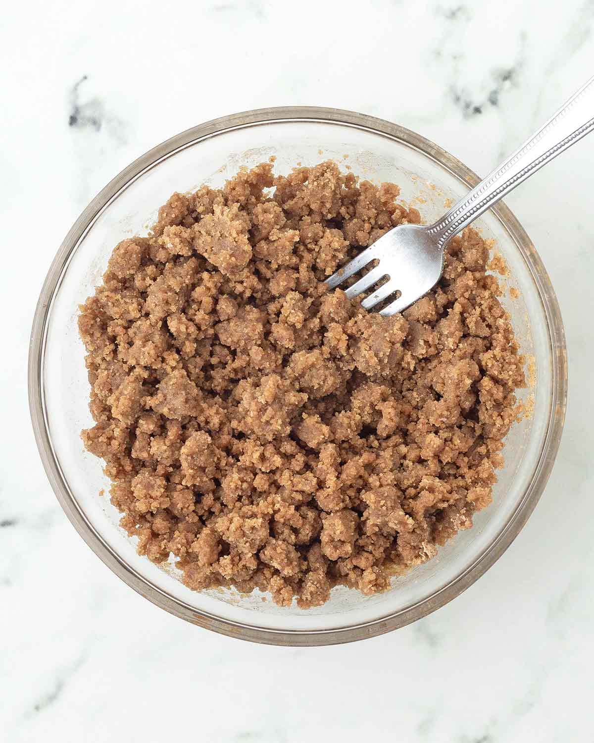 The cinnamon crumb for coffee cake in a bowl.