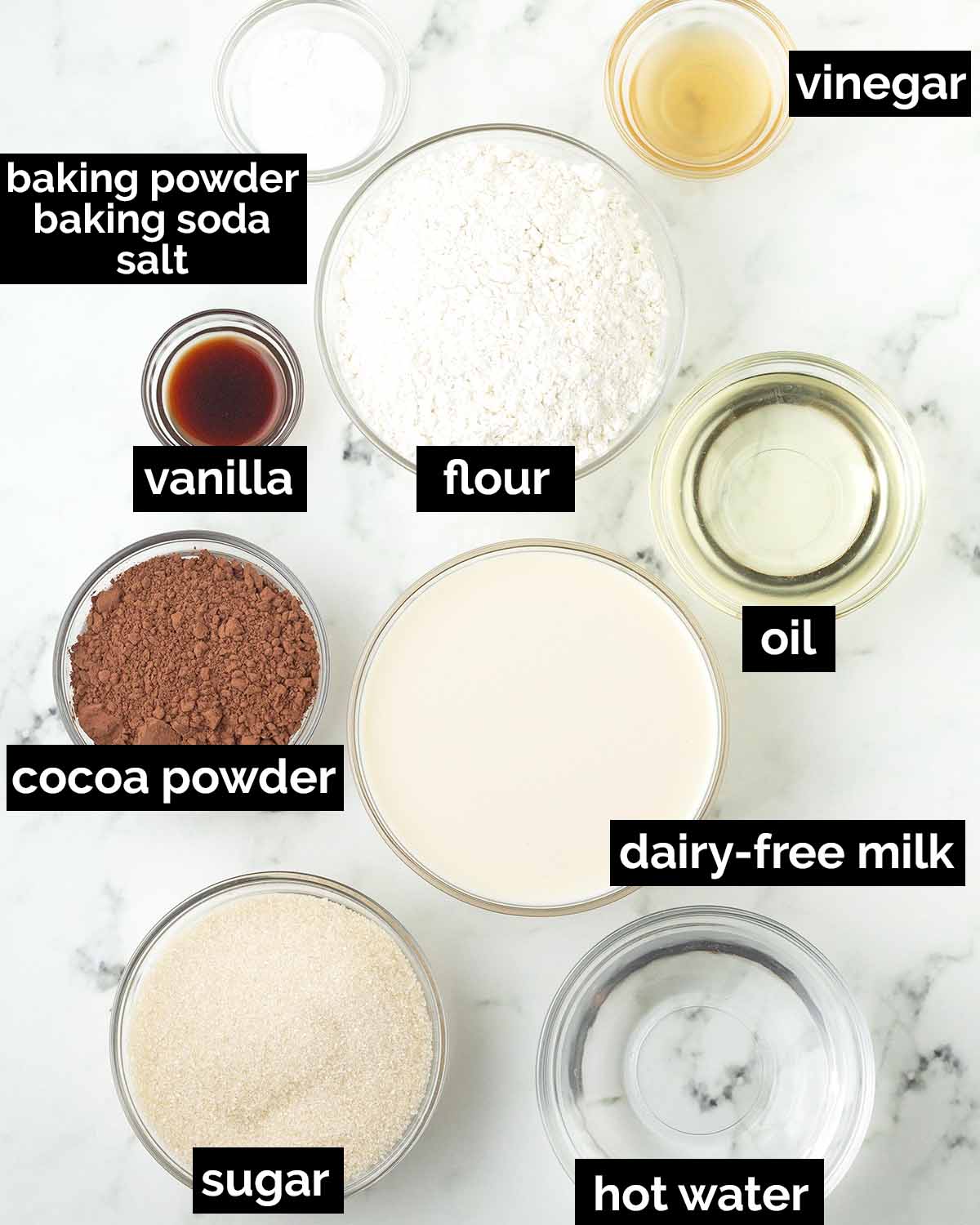 An overhead shot showing the ingredients needed to make vegan chocolate sheet cake.