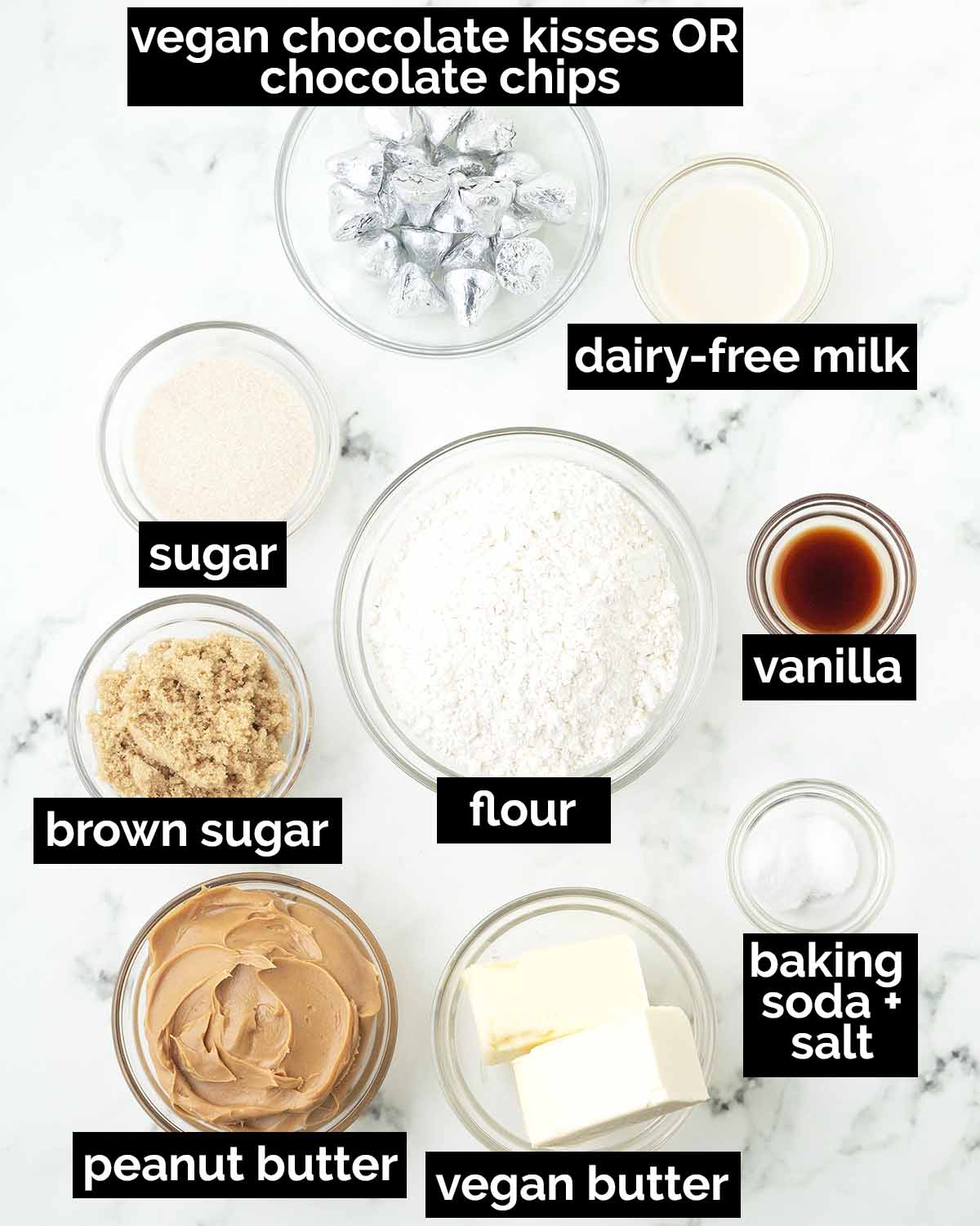 An overhead shot showing the ingredients needed to make vegan peanut butter blossoms.