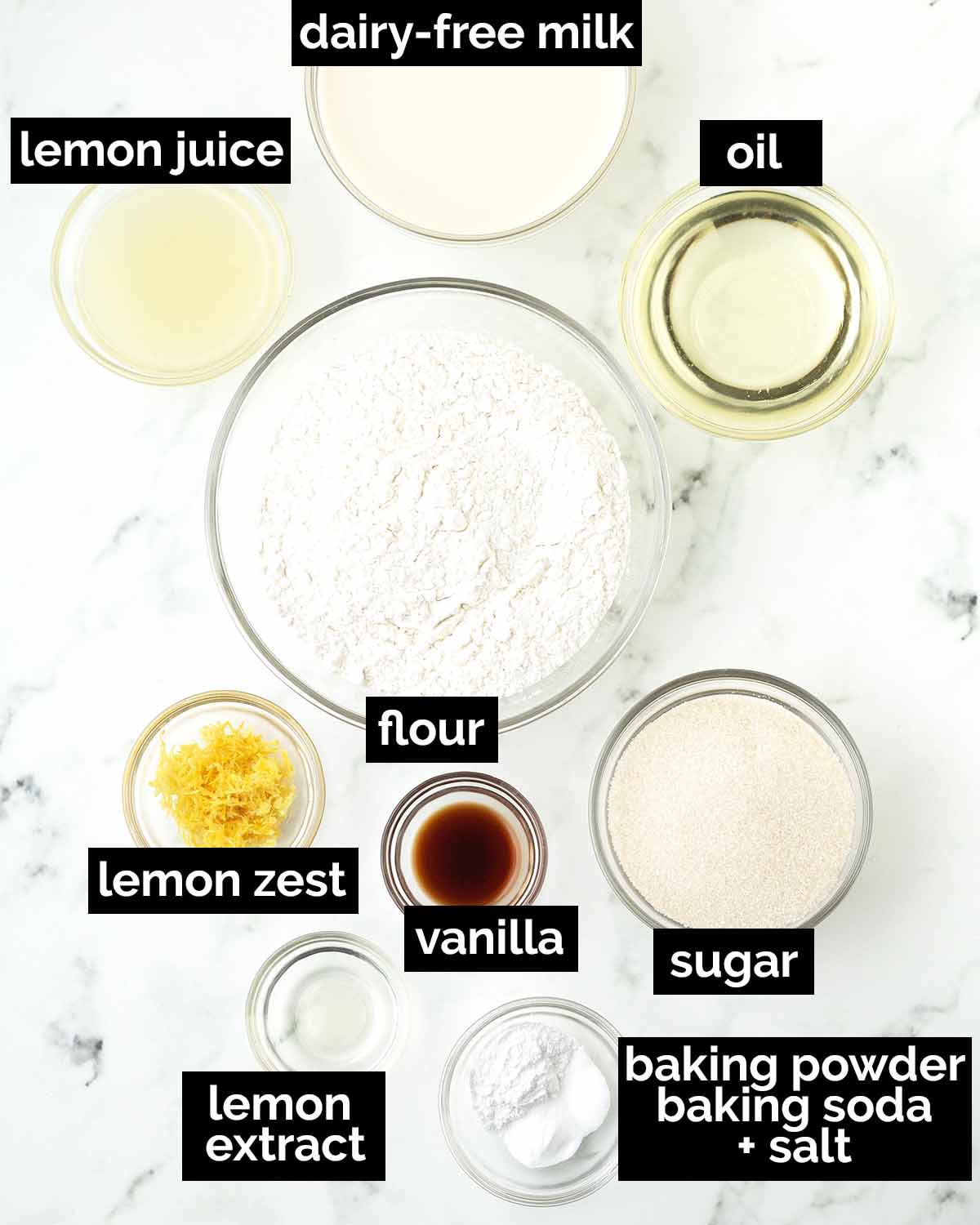 An overhead image showing the ingredients needed to make vegan lemon muffins.
