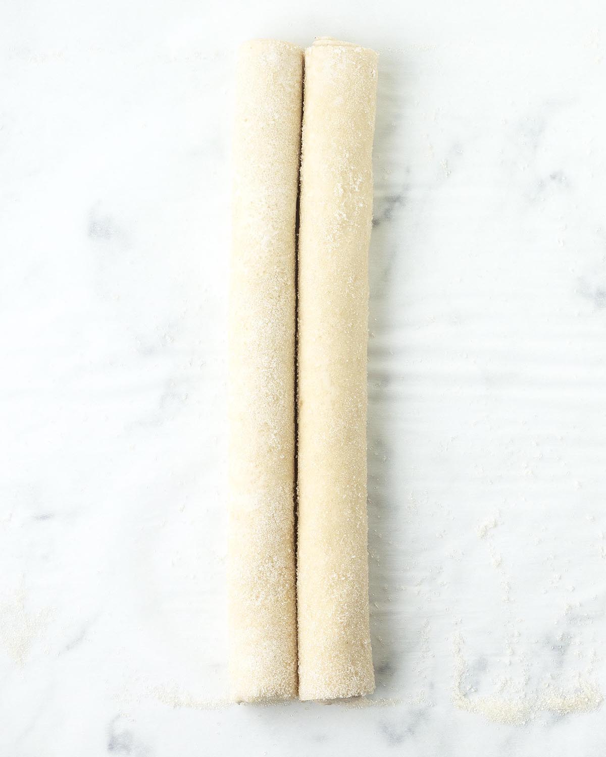A rolled up log of puff pastry.