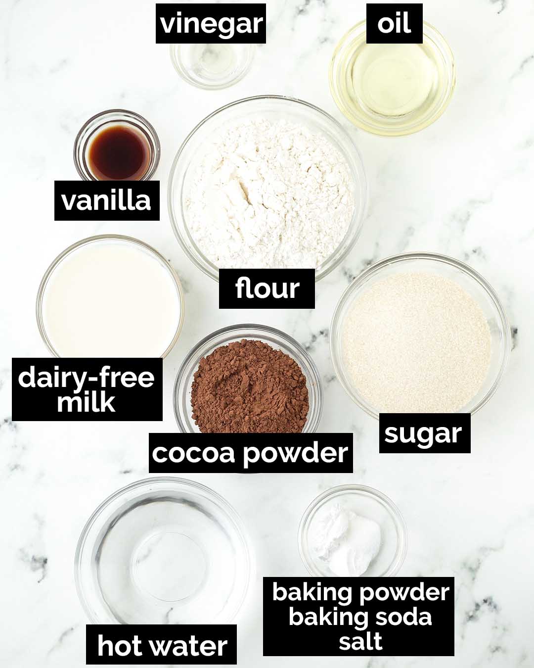An overhead image showing the ingredients needed to make vegan chocolate cupcakes.