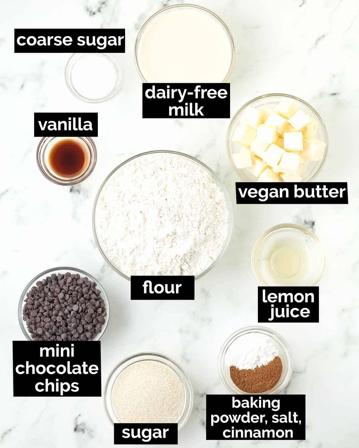 An overhead shot showing the ingredients needed to make vegan chocolate chip scones.