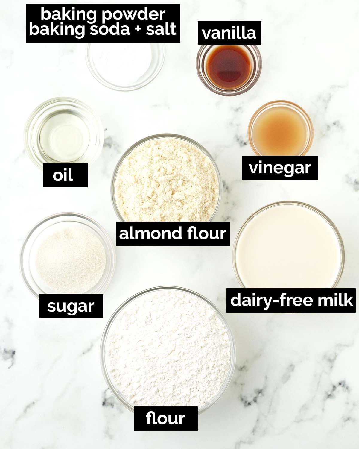 An overhead image showing the ingredients needed to make vegan almond flour pancakes.